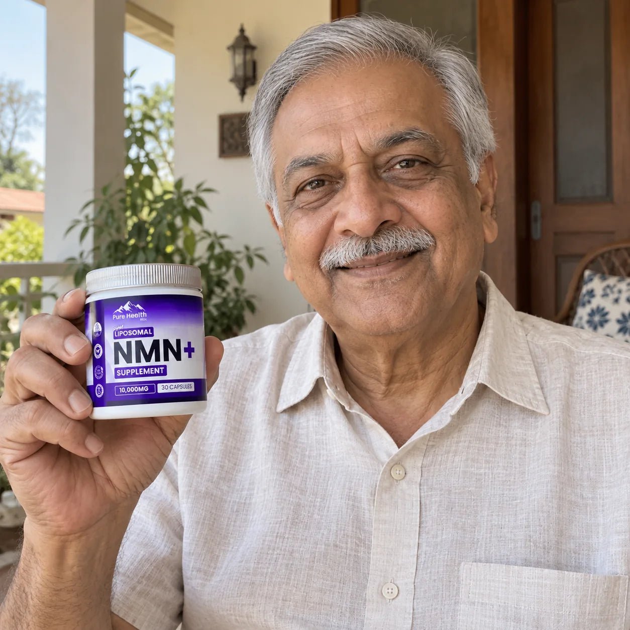 Illustrative photo of an older man holding PHM NMN+ on a porch