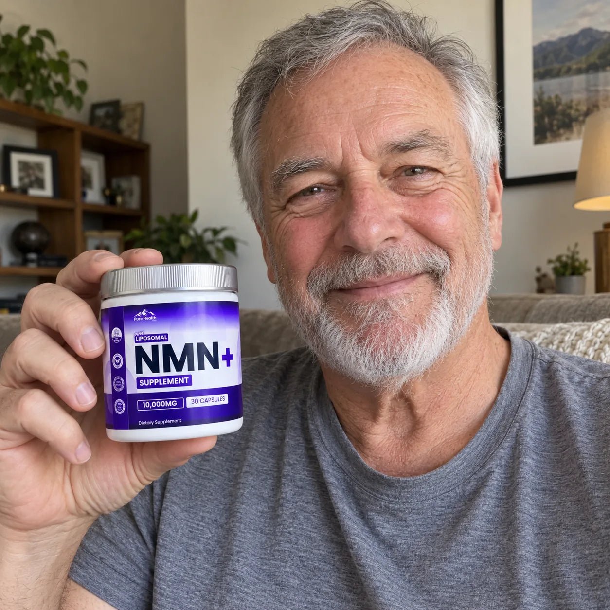 Illustrative photo of an older man holding PHM NMN+ at home