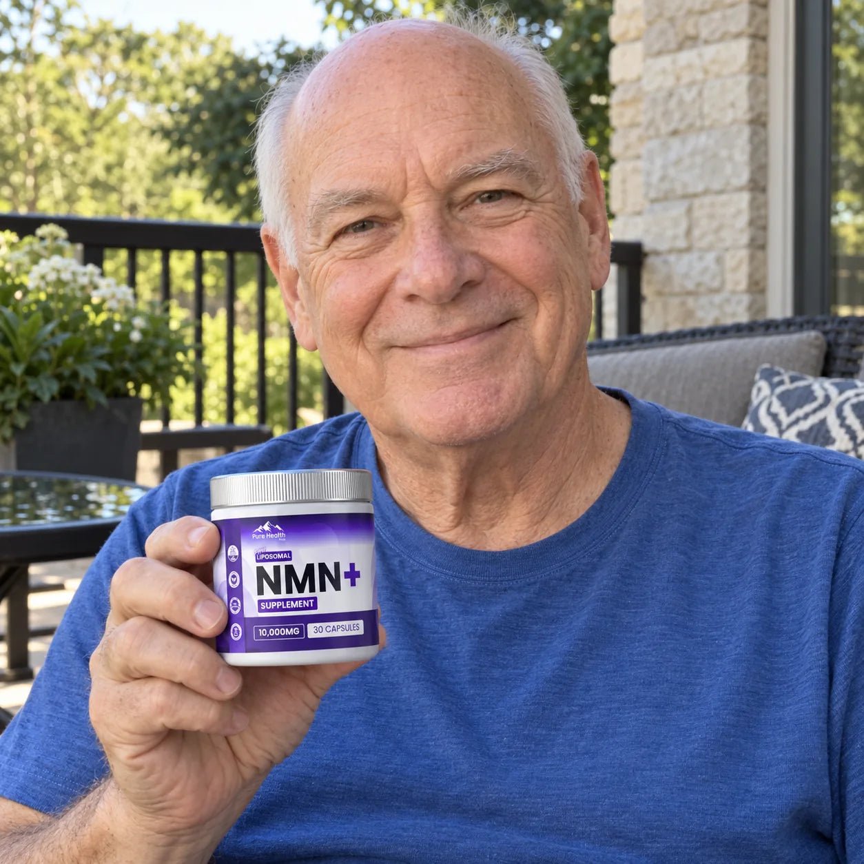 Illustrative photo of an older man holding PHM NMN+ on a patio